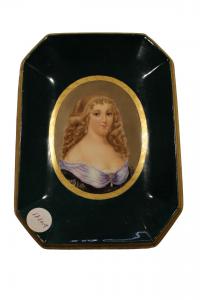 Late 19th century French porcelain plate with a lady and black and gold borders